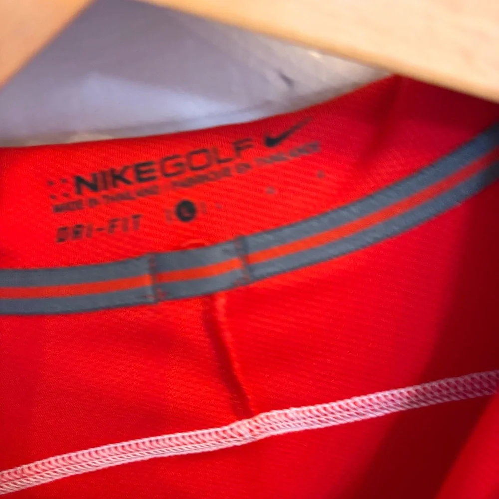 Nike women’s golf polo red with black sleeves slim fit
